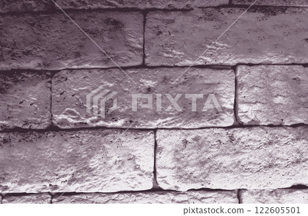 Monochrome old uneven wall lined with blocks Monochrome old uneven wall lined with blocks 122605501