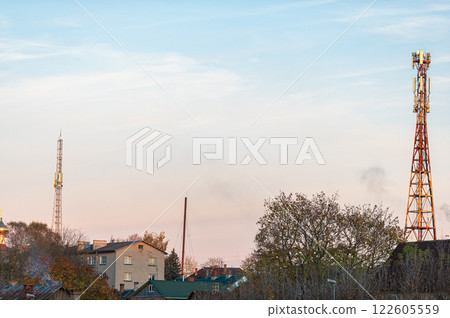 5G global network technology communication antenna tower for wireless high speed internet over roofs 122605559