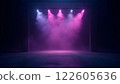 A dark, futuristic space illuminated by vibrant pink and purple lights with hazy fog 122605636