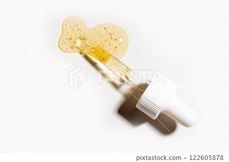 Retinol serum pipette on white background 122605878