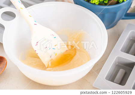 Add honey to the financier dough 122605929