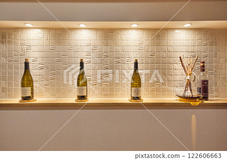Wine bottles in a niche in the hallway Wine bottles in a niche in the hallway 122606663