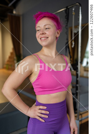 The Dynamic Fitness Model in a Studio showcasing Pilates and Wellness practices and activities 122607466