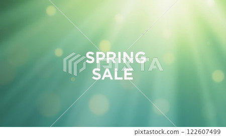 Spring sale text on a green background with sunlight rays and bokeh effect. Seasonal promotional design with bright atmosphere 122607499