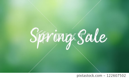 Spring Sale text in handwritten script on green blurred background. Minimalistic seasonal banner template for advertising and promotions 122607502