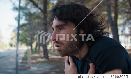 Cold Caucasian Boy Trying To Warm Up Having Chills Outdoor In The Park Cold Caucasian Boy Trying To Warm Up Having Chills Outdoor In The Park 122608055