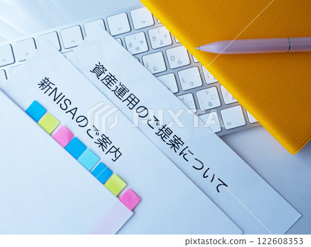 Documents, keyboard and notebook on the table 122608353