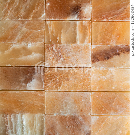 background of colorful Himalayan salt tiles on the sauna wall 122608484