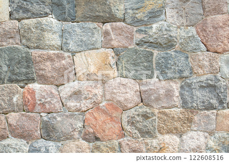 old fortress wall made of natural stone close-up old fortress wall made of natural stone close-up 122608516