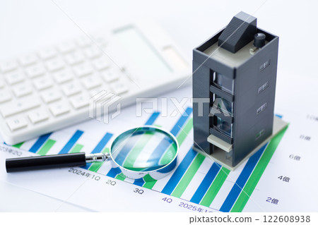 Company performance graph, corporate building, magnifying glass and calculator Company performance graph, corporate building, magnifying glass and calculator 122608938