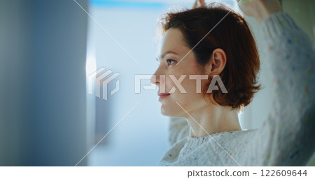 Airport Terminal: Close Up of Woman Passing Through X-ray Metal Detector Scanner Gates 122609644