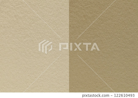 Texture of craft beige and brown paper background, half two colors, macro. Structure of vintage dense sand cardboard. 122610493