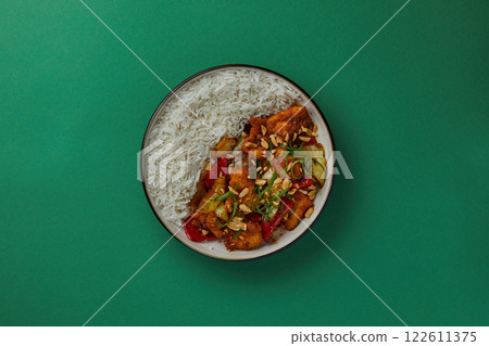 top shot on blue background black salad plate with Chinese rice and cabbage kim chi asian cuisine healthy eating top shot on blue background black salad plate with Chinese rice and cabbage kim chi asian cuisine healthy eating 122611375