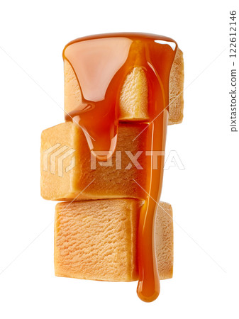 stack of caramel candies stack of caramel candies 122612146