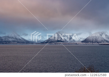 Landscape with a fjord and mountains, Harstad, Norway Landscape with a fjord and mountains, Harstad, Norway 122612580