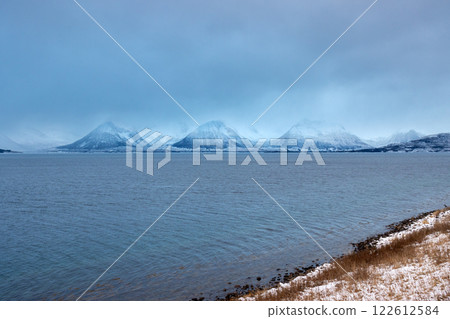 Landscape with a fjord and mountains, Harstad, Norway 122612584