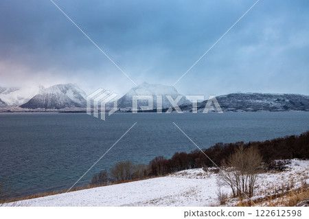 Landscape with a fjord and mountains, Harstad, Norway Landscape with a fjord and mountains, Harstad, Norway 122612598