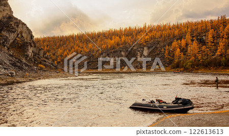 Heavenly evening and water landscape during autumn fishing on the Siberian river. Heavenly evening and water landscape during autumn fishing on the Siberian river. 122613613