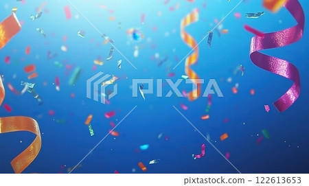 a festive scene of colorful confetti and streamers floating against a vibrant blue background 122613653