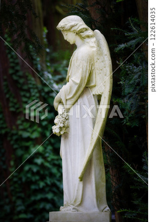 white angel sculpture in a cemetery 122614035