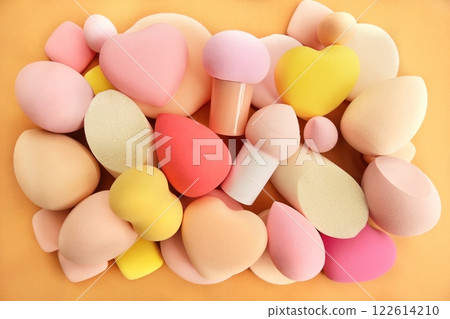 Varieties of applicators and sponges for basic make up, colorful beauty background, selective focus 122614210