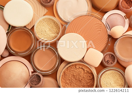 Varieties of face powders and foundations for perfect complexion, basic make up products to even out and matte skin, beauty cosmetics with brushes and sponges, selective focus 122614211