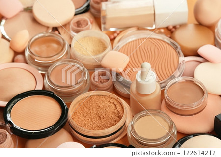 Varieties of face powders and foundations for perfect complexion, basic make up products to even out and matte skin, beauty cosmetics with brushes and sponges, selective focus, shallow DOF 122614212
