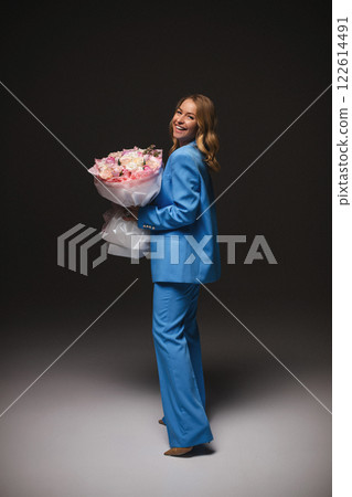 Beautiful stylish woman in a blue suit with Beautiful stylish woman in a blue suit with 122614491