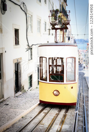 a funicular railway car of the historic Elevador da Bica in Lisbon a funicular railway car of the historic Elevador da Bica in Lisbon 122614908