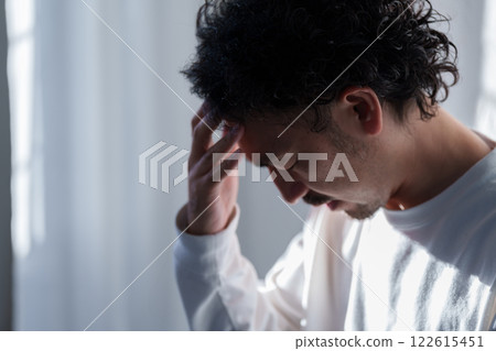 Middle aged man suffering 122615451