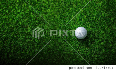 Close-up view of a golf ball on bright nylon turf with vibrant green texture in daytime 122615504