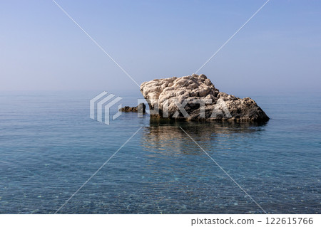 Lone Rock Formation in Calm Sea Lone Rock Formation in Calm Sea 122615766
