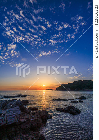 The ocean and Kagura Island dyed in the colors of the sunset on Nagasaki Sunset Road The ocean and Kagura Island dyed in the colors of the sunset on Nagasaki Sunset Road 122616223