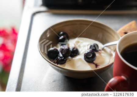 Blueberry yogurt and coffee 122617630