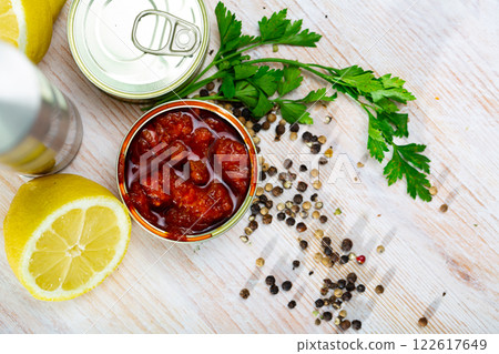 Canned sauced calmary 122617649
