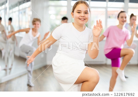 Group of boys and girls dancing dancehall Group of boys and girls dancing dancehall 122617692