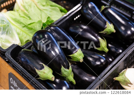 Fresh eggplants in plastic boxes 122618084