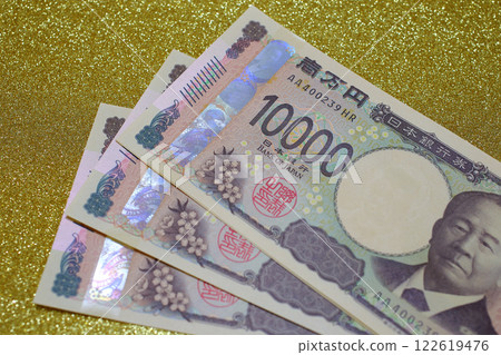 10,000 yen note Japanese yen gold background 10,000 yen note Japanese yen gold background 122619476