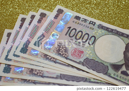 10,000 日元紙幣日元黃金背景 122619477