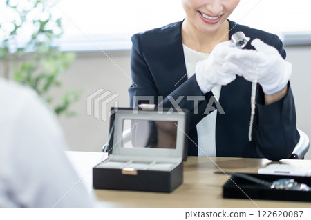 A professional metal buyer checking the metals, no face 122620087
