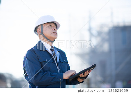 Veteran construction manager and architect Veteran construction manager and architect 122621669