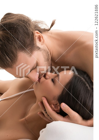 Happy family kissing in bed isolated shot 122621886