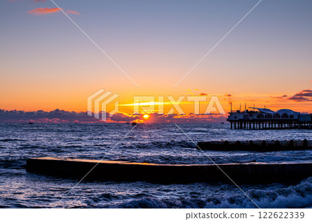 A picturesque sunset light on the sea 122622339