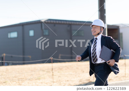 Veteran construction manager and architect Veteran construction manager and architect 122622389