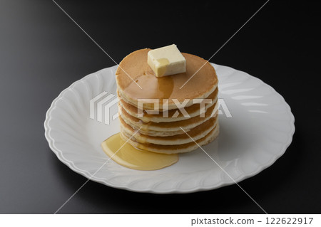 Hotcakes with honey Hotcakes dripping with honey Hotcakes with honey Hotcakes dripping with honey 122622917