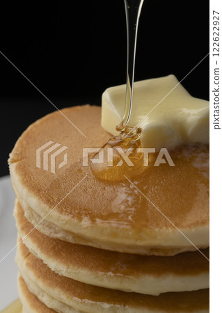 Hotcakes with honey Hotcakes dripping with honey Hotcakes with honey Hotcakes dripping with honey 122622927