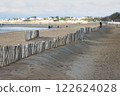 Coastal Lines: Wooden Fence Along the Beach 122624028