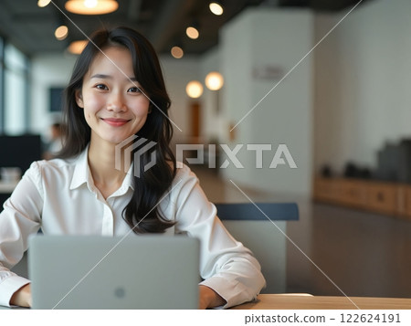 A woman heading to a computer 122624191