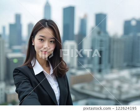 Young business woman working in the office 122624195