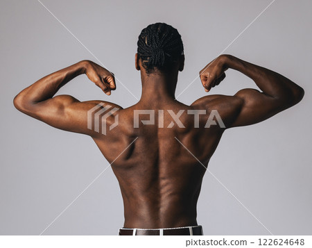 Male toned back muscles Male toned back muscles 122624648
